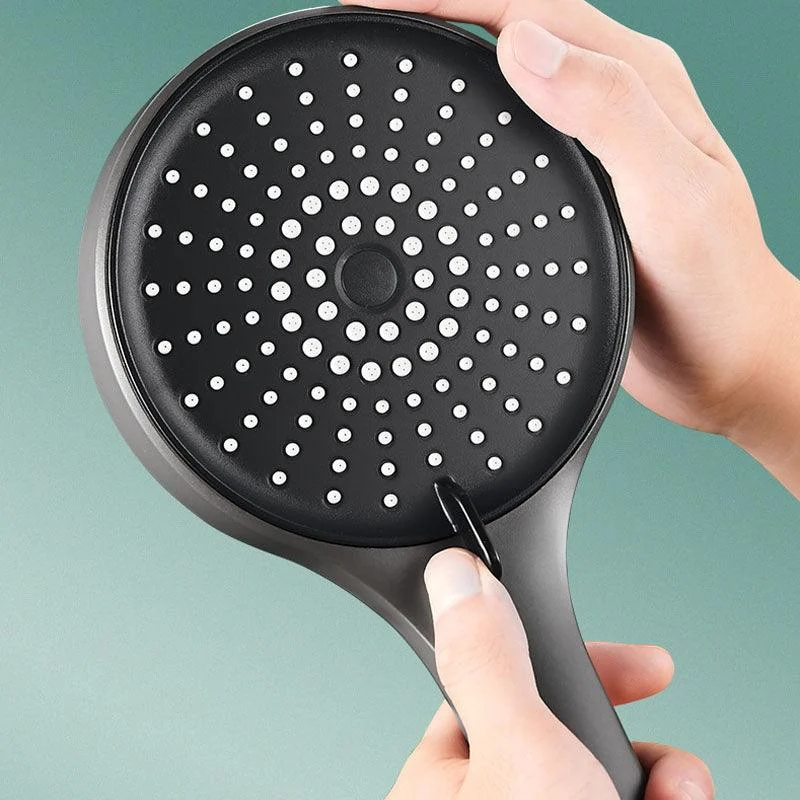 Plastic Hand Shower Round Handheld Shower Head with Self-Cleaning -Bathlova